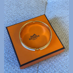 Hermès Olympe Bracelet – White Enamel with Gold Hardware (Size T3)