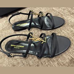 Saint Laurent Black Cassandre Flat Sandals – Size 38
