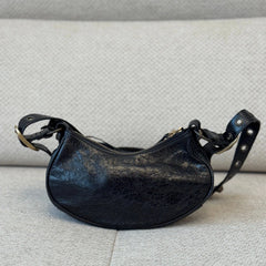 Balenciaga Le Cagole XS Shoulder Bag in Black Arena Lambskin with Charms