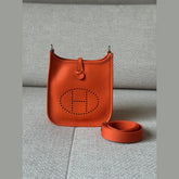 Hermès Orange Mini Evelyne PHW