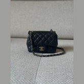 Chanel Black Quilted Mini Classic Flap Bag