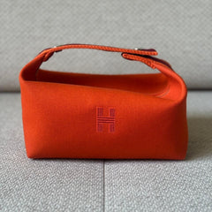Hermès Orange Bride-A-Brac Case PM
