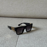 Miu Miu Black Square Sunglasses with Gold Logo Detail