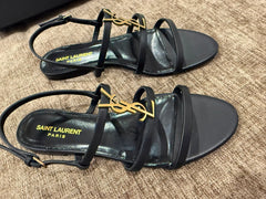 Saint Laurent Black Cassandre Flat Sandals – Size 38